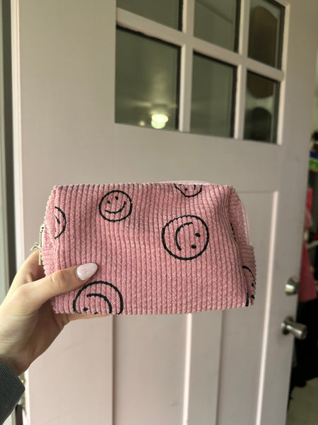 Smiley face makeup bag